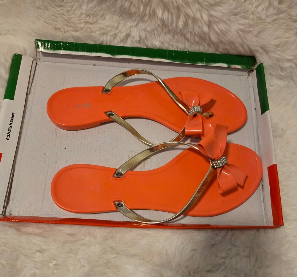 Dizzy Coral Rhinestone Bow Jelly Flip Flops